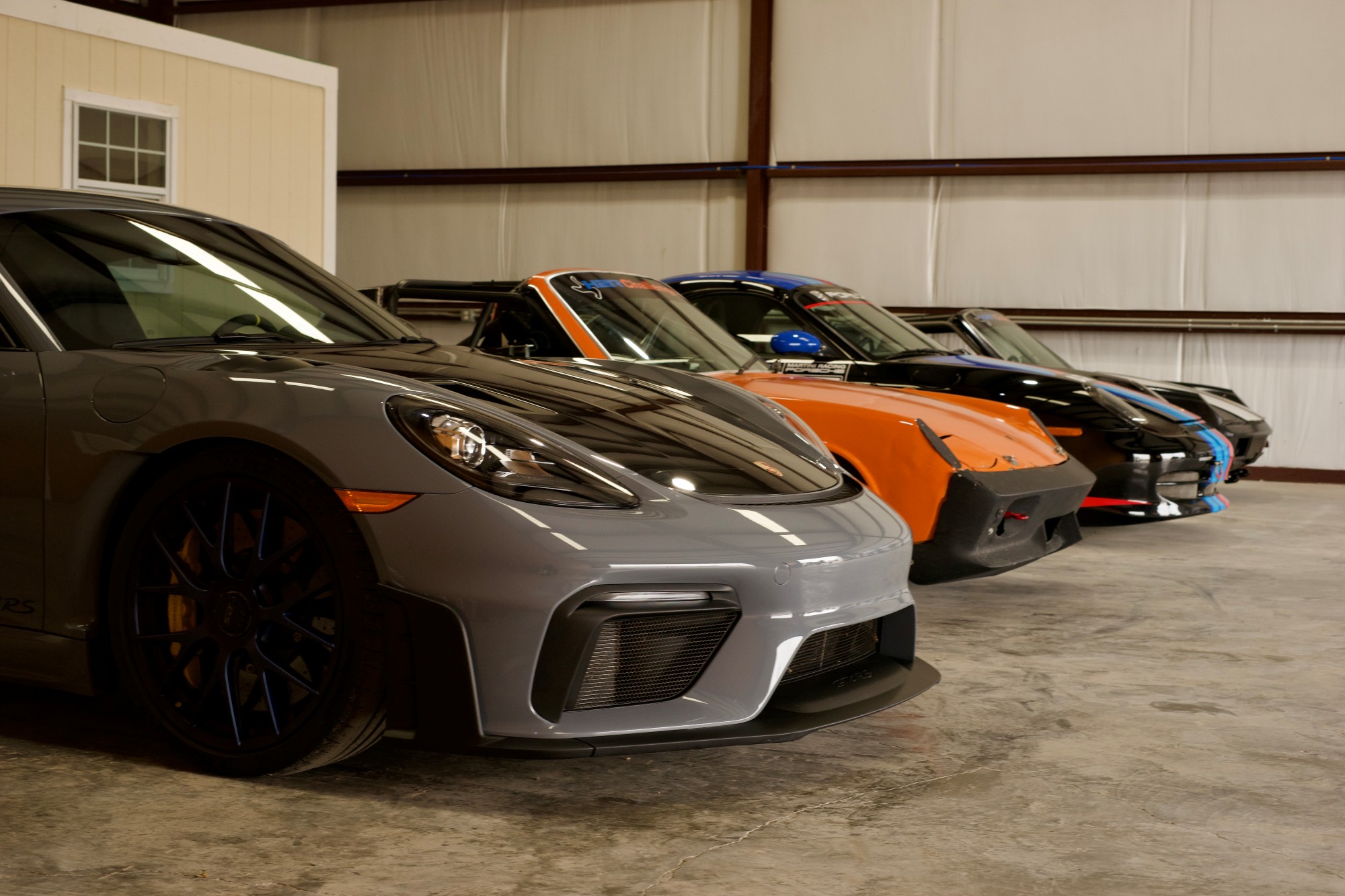 Cars stored side by side inside the 202 Garage facility