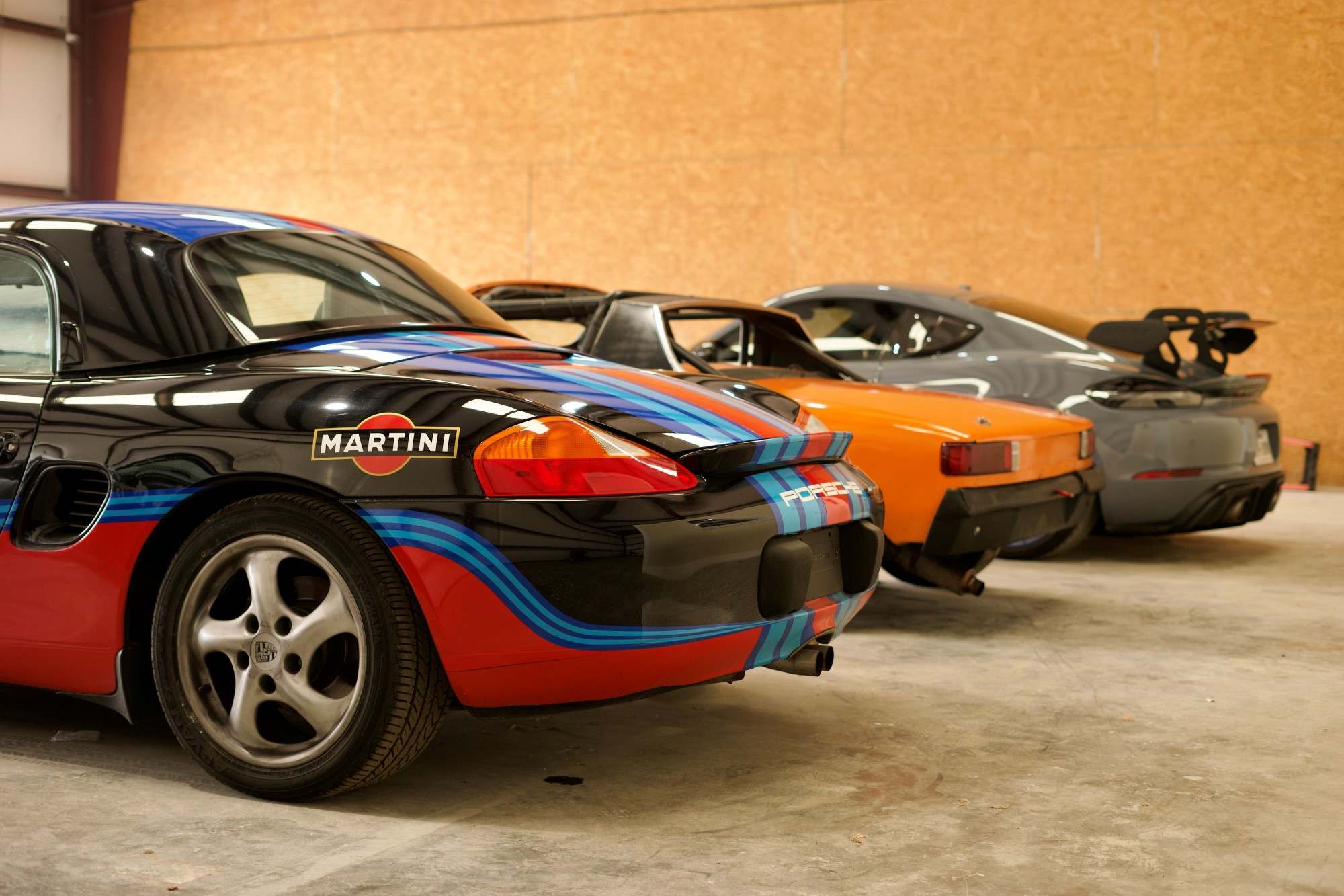 Rear three-quarter view of stored cars